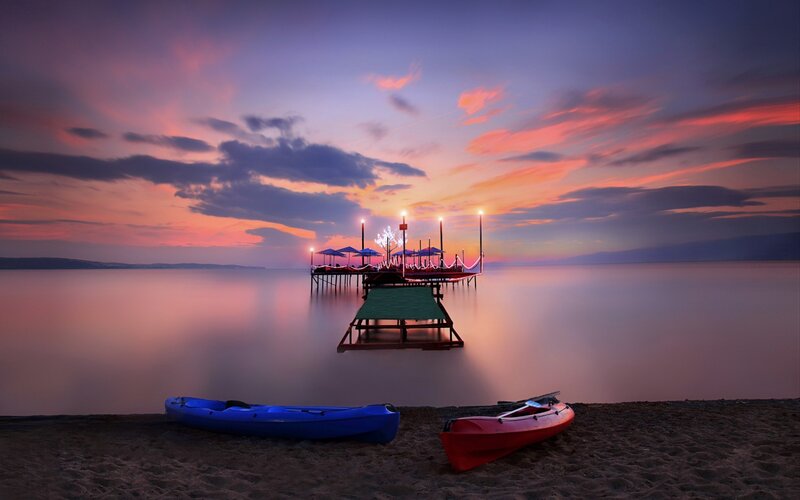 Kayaks on Beach at Sunset — Purple