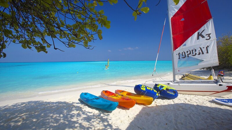 Kayaks on Beach — Blue, Serene