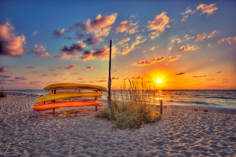 Kayaks on Beach — Orange
