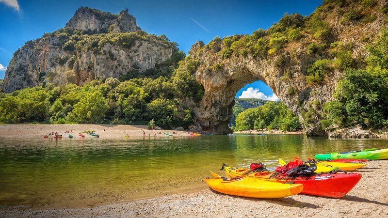 Kayaks on Riverbank