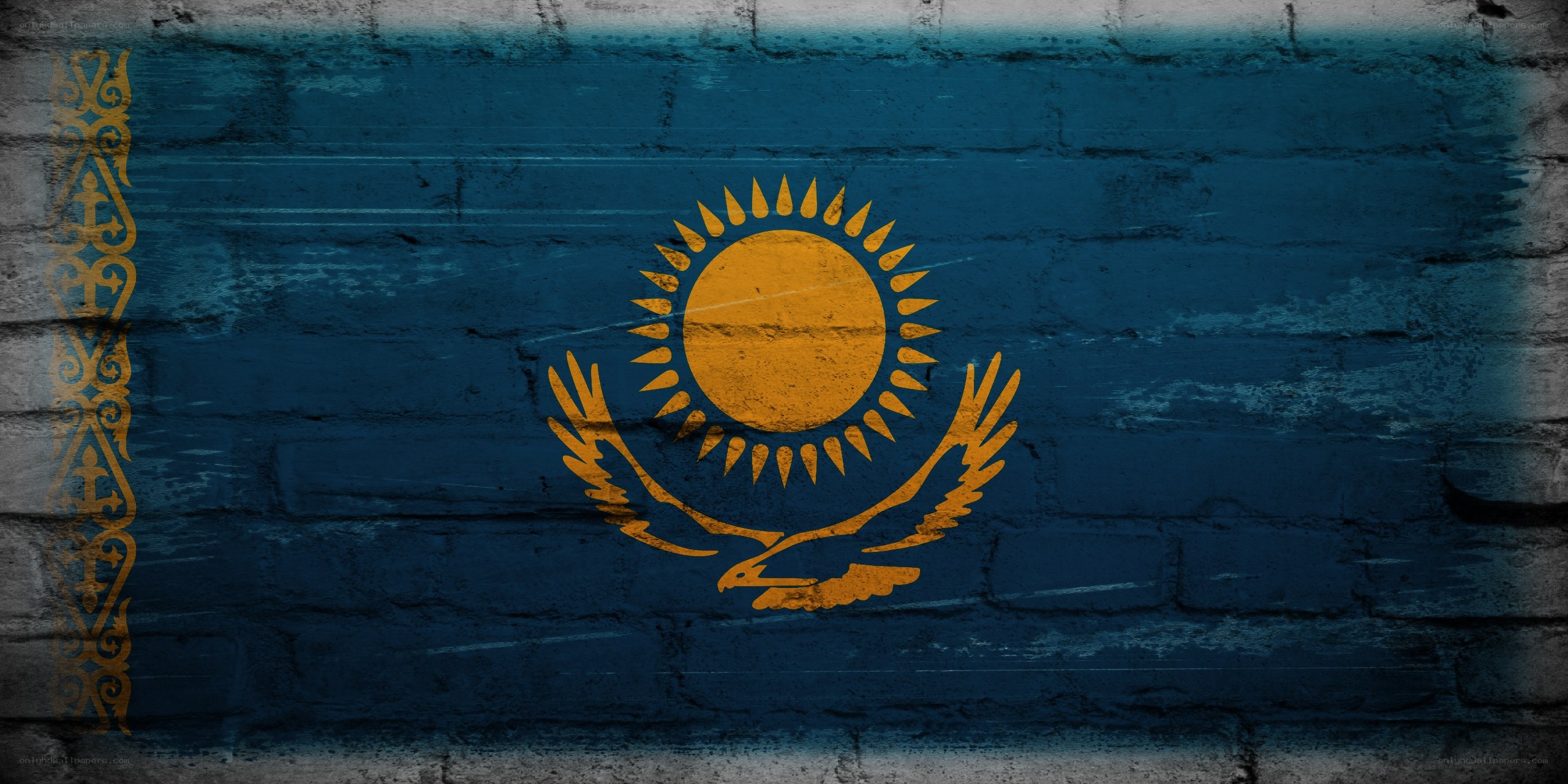 Kazakhstan flag on brick wall