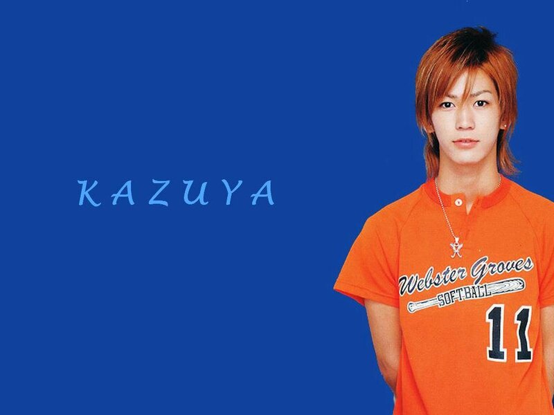 Kazuya in orange shirt