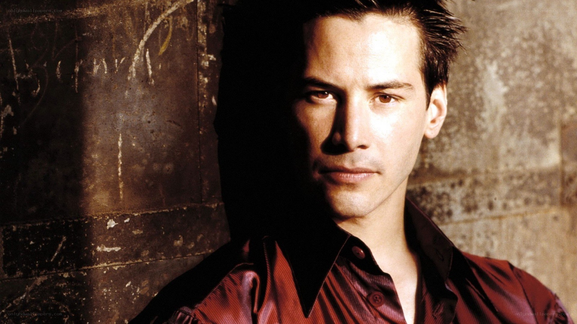 Keanu Reeves in red shirt