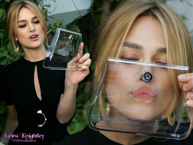 Keira Knightley holding clear bag
