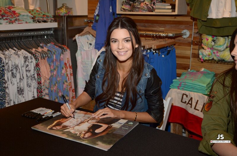 Kendall Jenner signing autograph