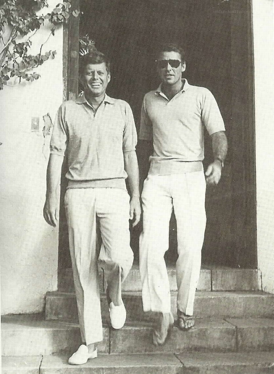 Kennedy and a friend on steps