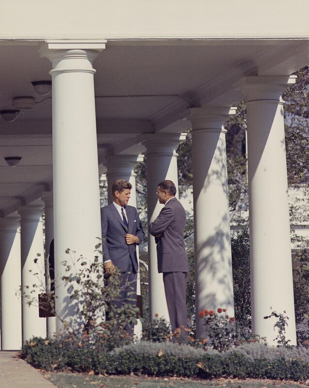 Kennedy and a man talking