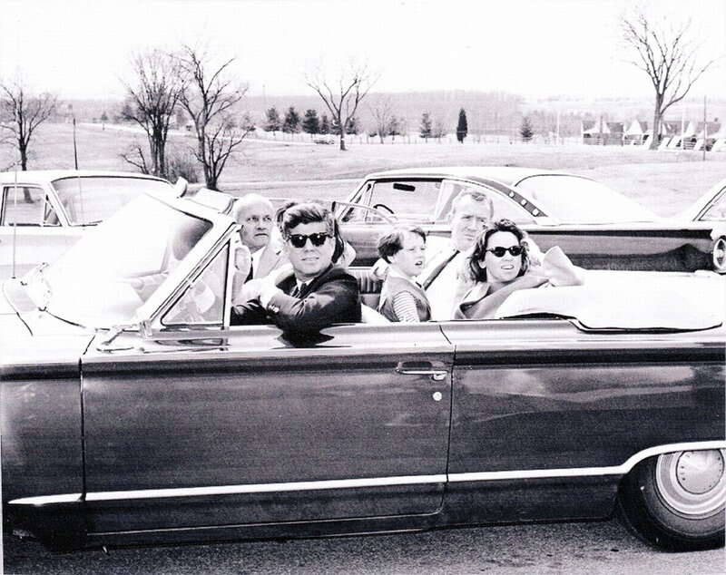 Kennedy family in convertible