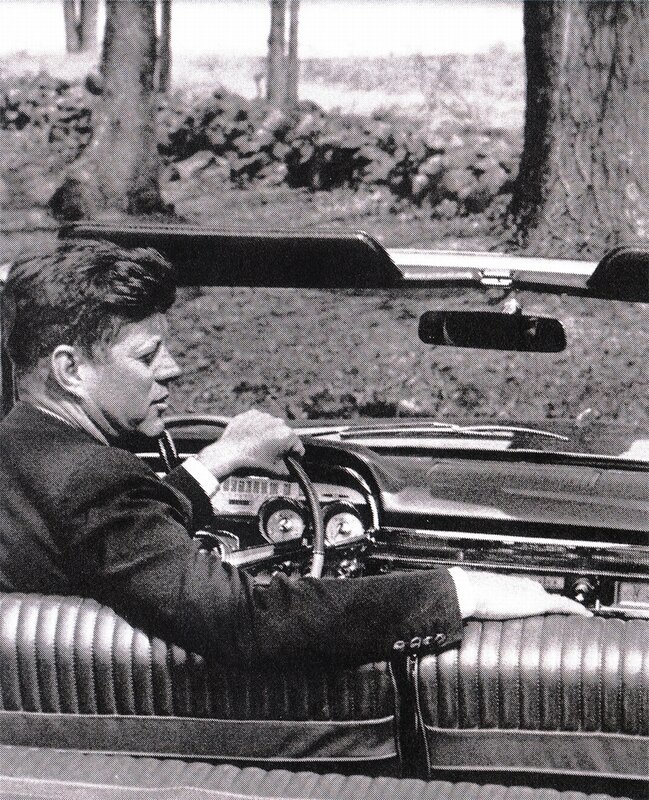 Kennedy in a convertible car