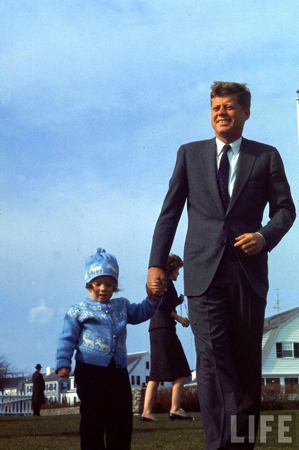 Kennedy with child outdoors