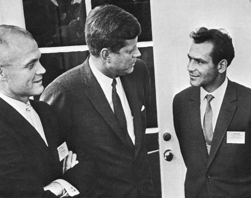 Kennedy with two men