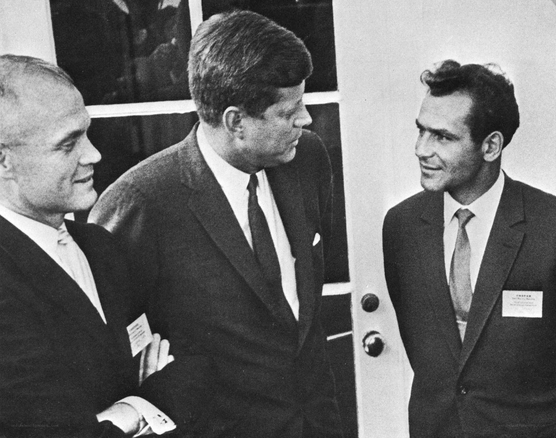 Kennedy with two men