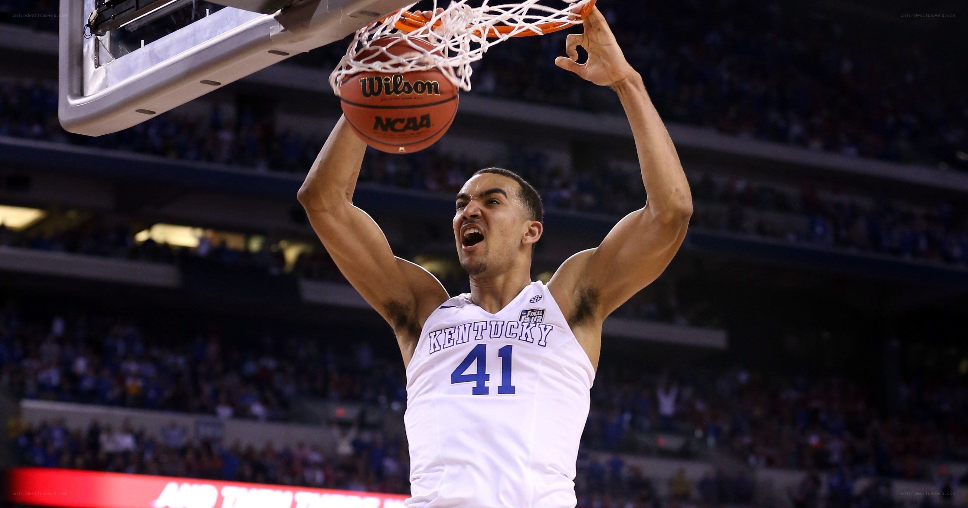 Kentucky basketball player dunks