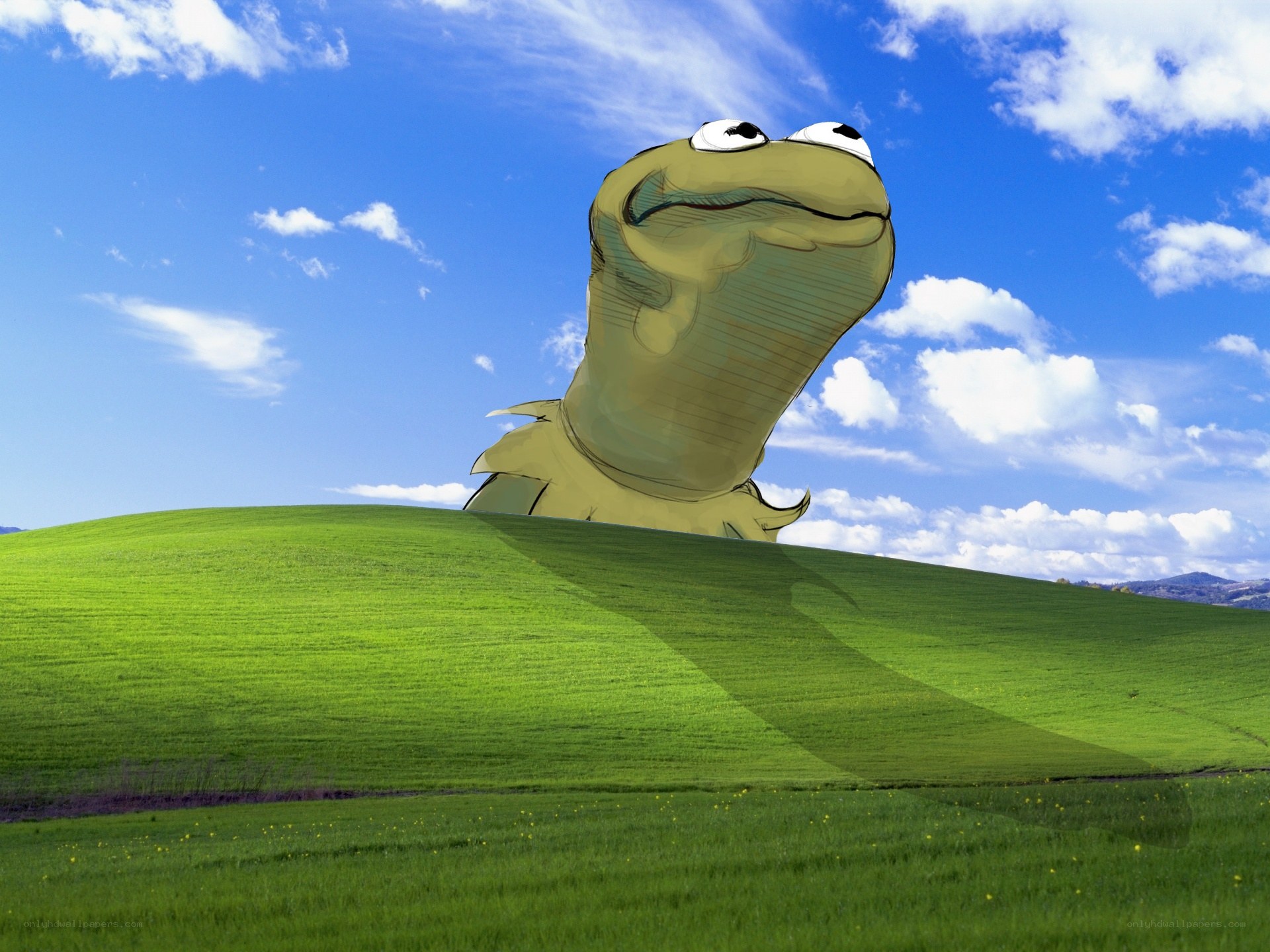 Kermit on a green hill