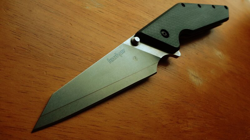 Kershaw folding knife on wood