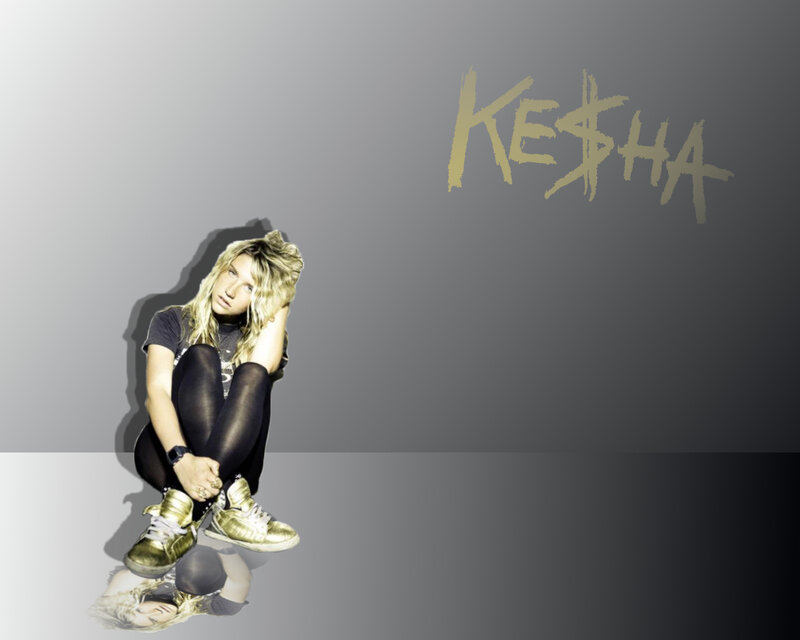 Kesha sitting on floor