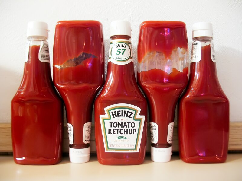 ketchup bottles on a counter