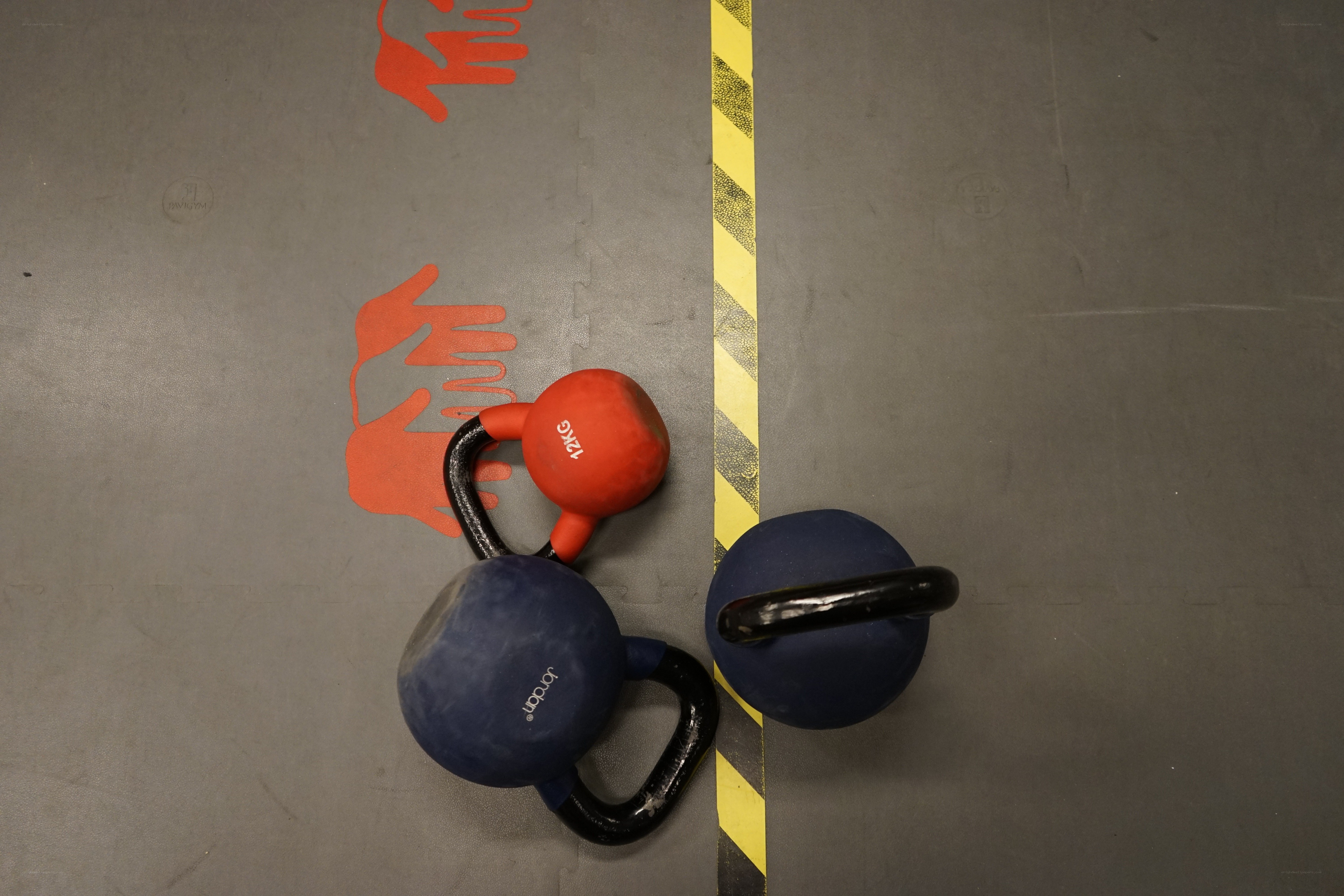 Kettlebells on gym floor