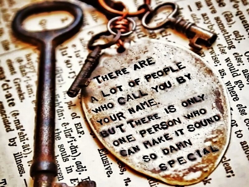 Key and Pendant on Book