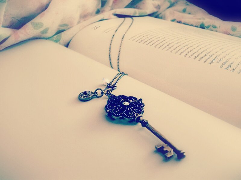 Key-shaped Necklace on Book