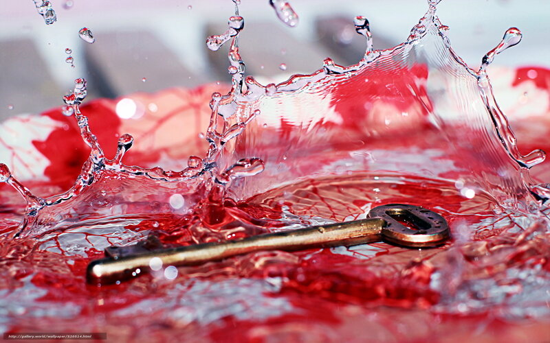 key splashing in red liquid