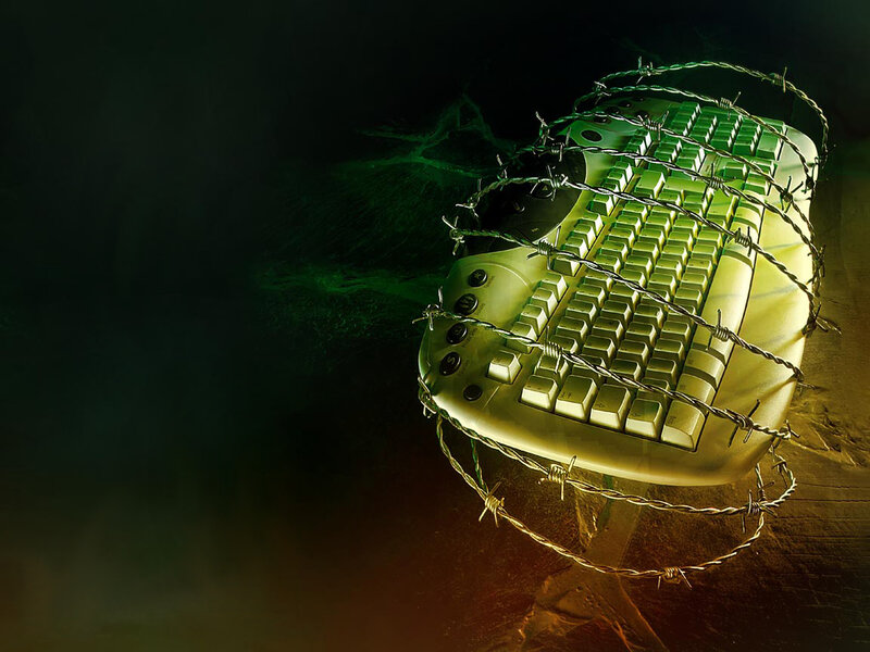 keyboard wrapped in barbed wire
