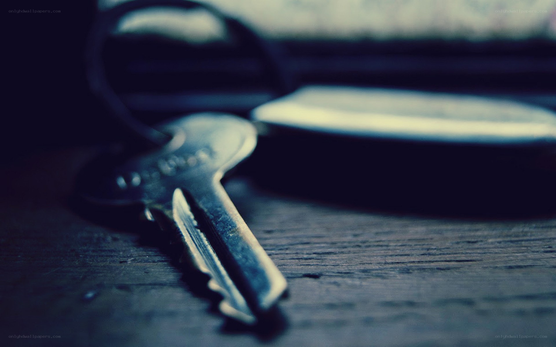 Keys on a wooden surface
