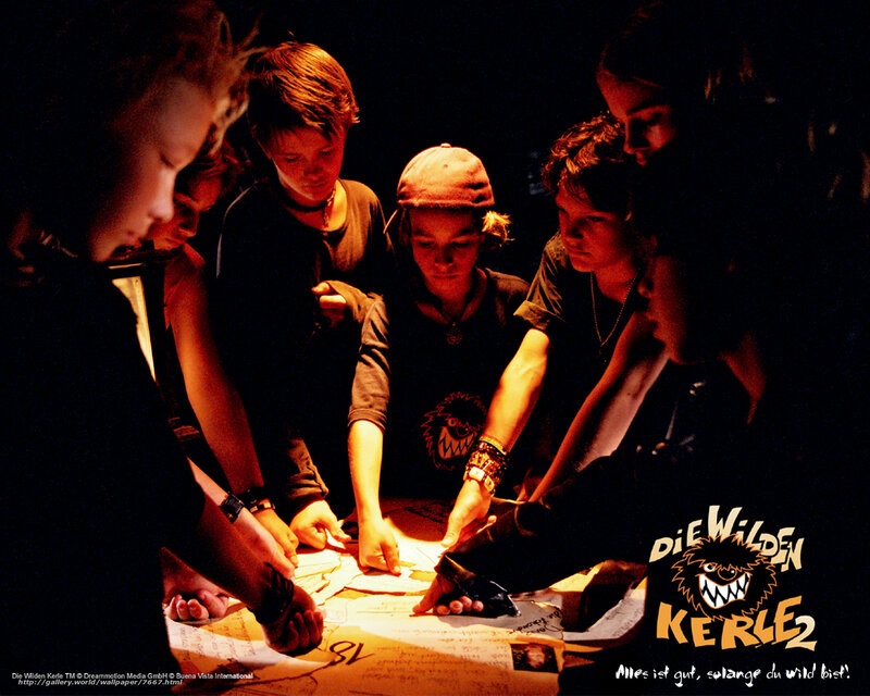 Kids around a map
