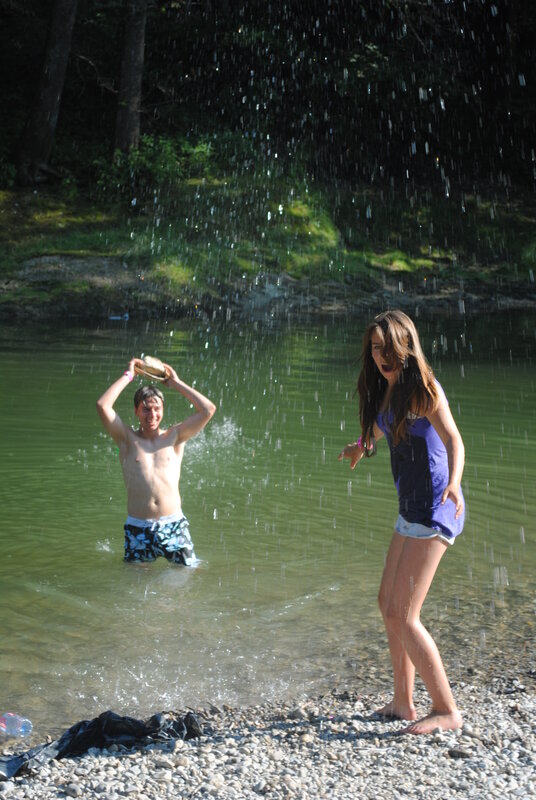 Kids playing in river water