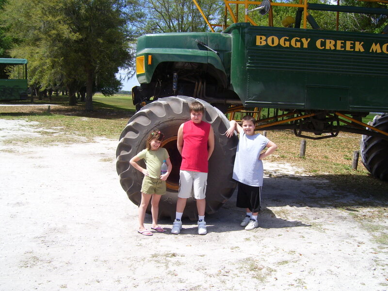 Kids with monster truck tire