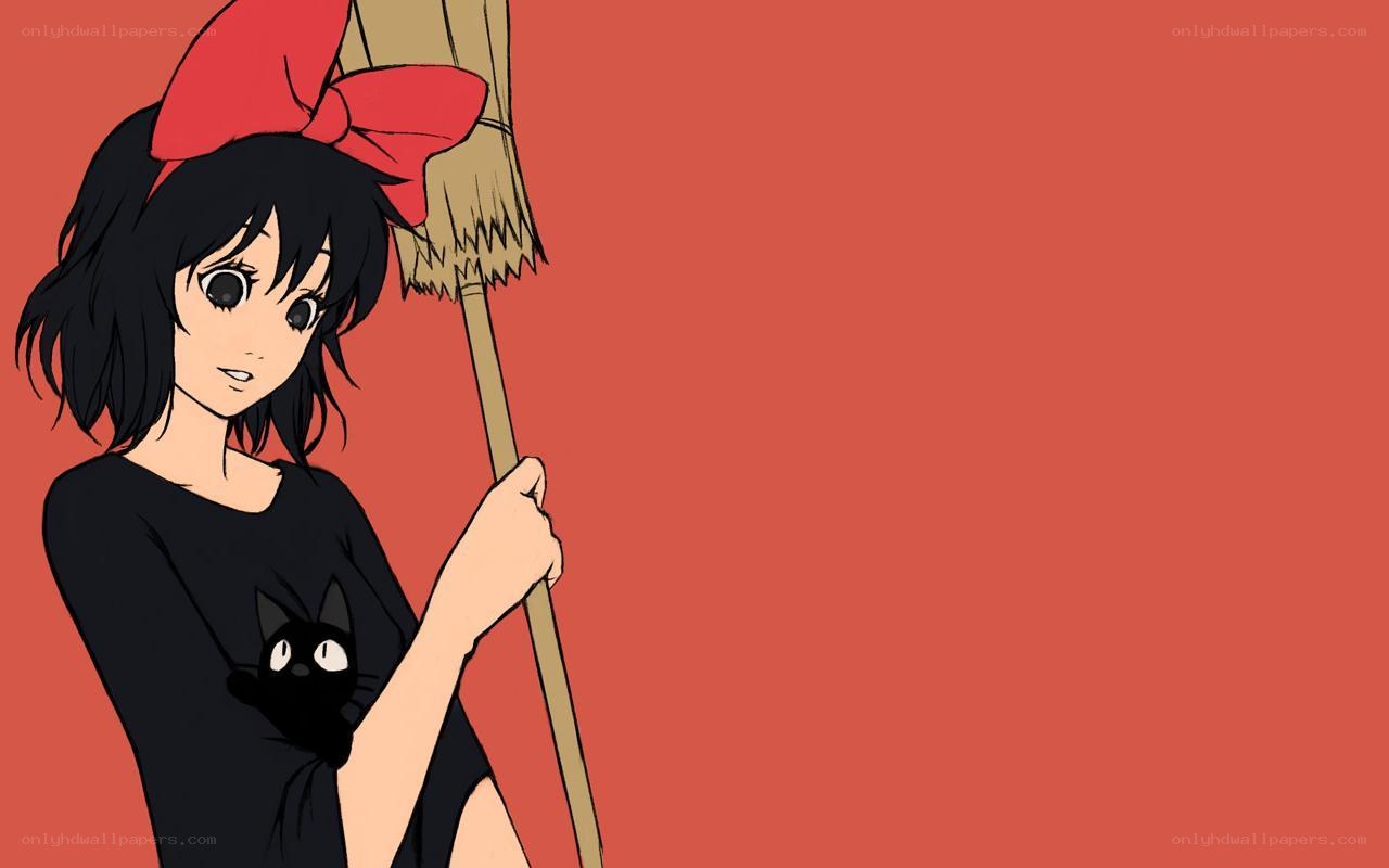 Kiki with broom and cat