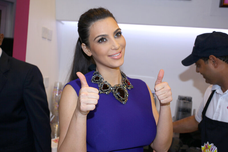 Kim Kardashian giving thumbs up