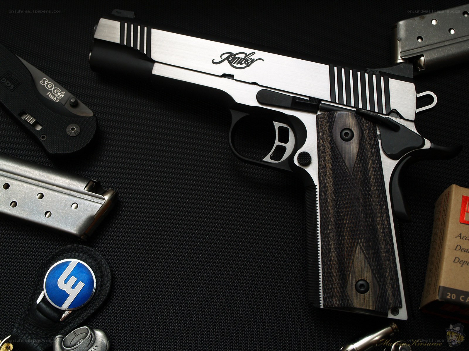 Kimber pistol with accessories