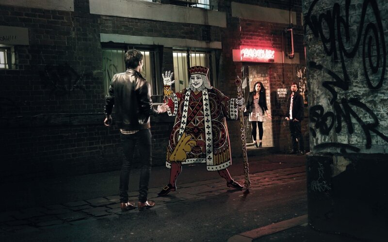 King of Hearts in an alley