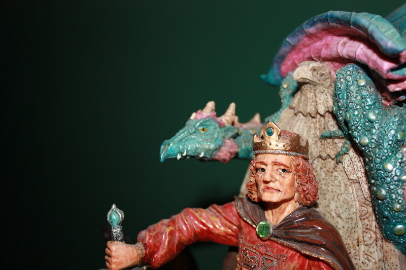 king with dragon figurine