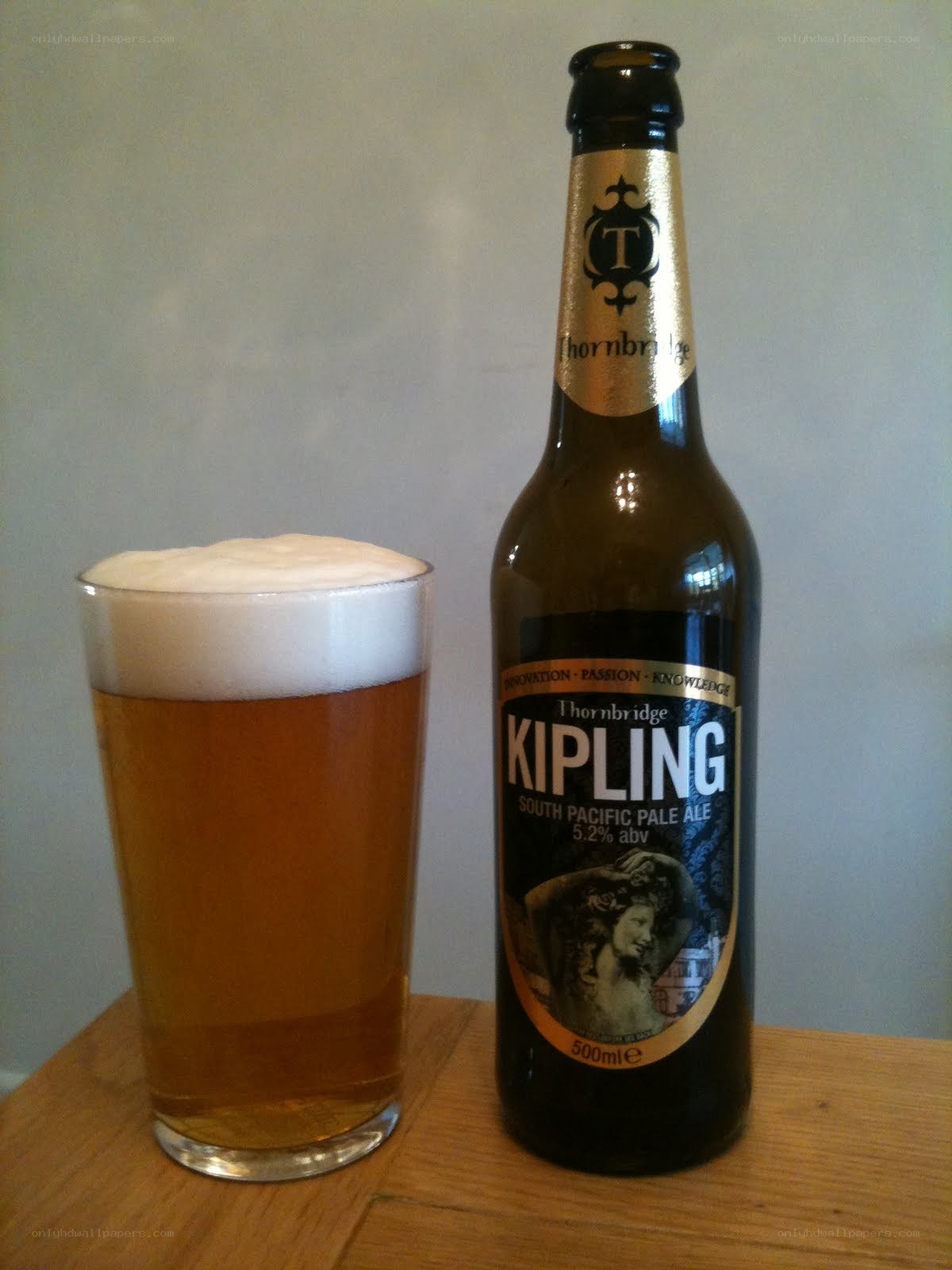 Kipling pale ale bottle and glass