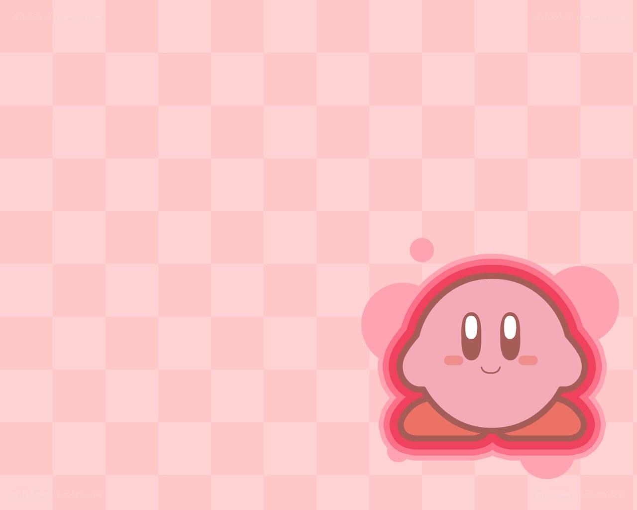 Kirby on pink checkered background