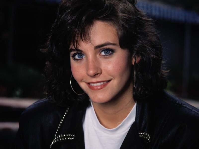 Kirstie Alley in a leather jacket