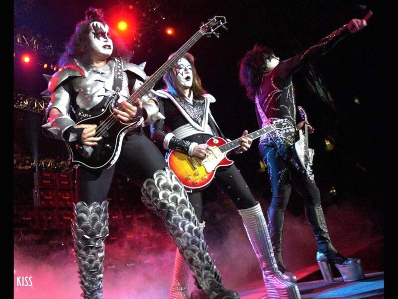 KISS Band Members on Stage — Black, Dramatic