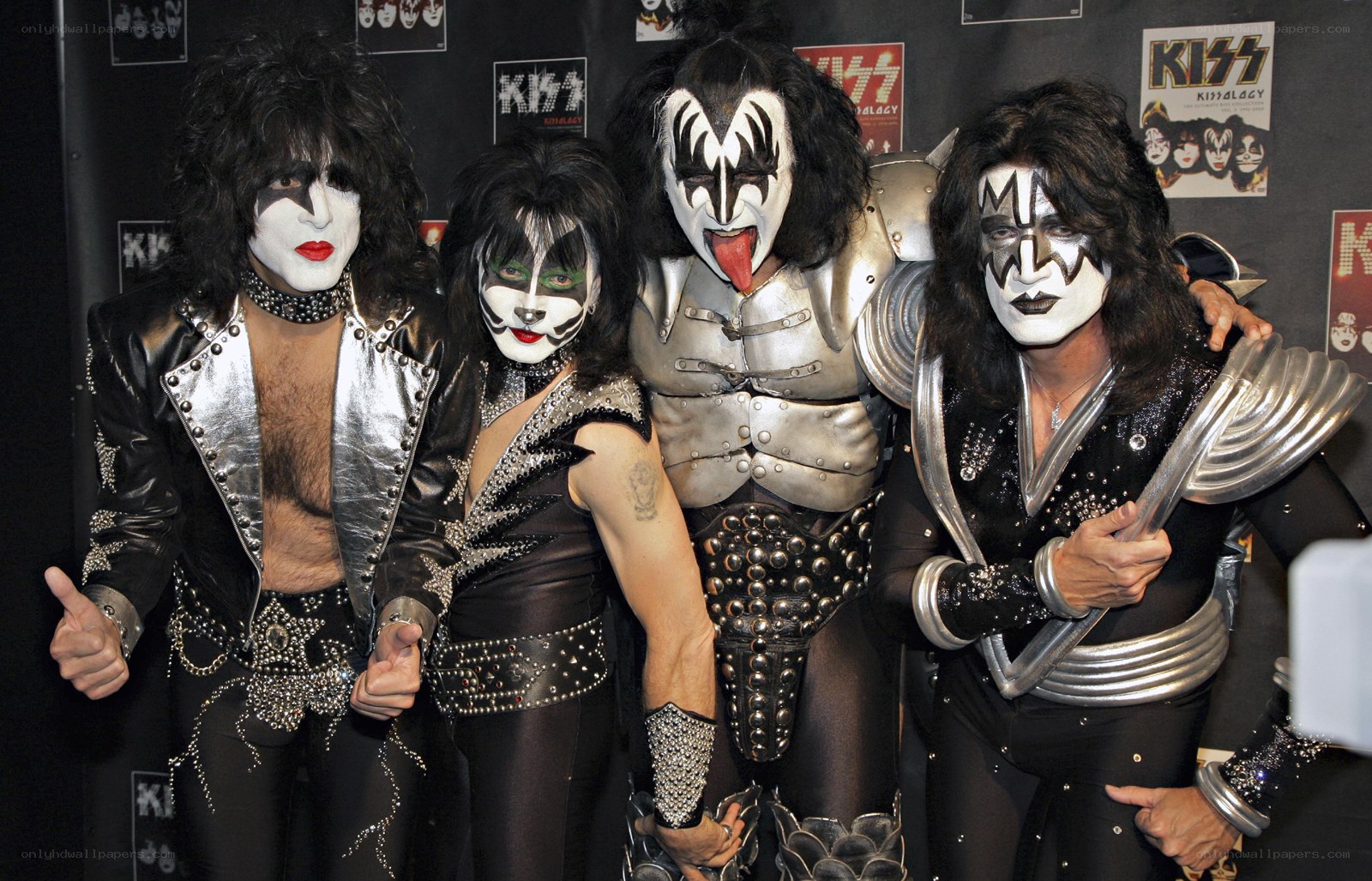 KISS band members posing