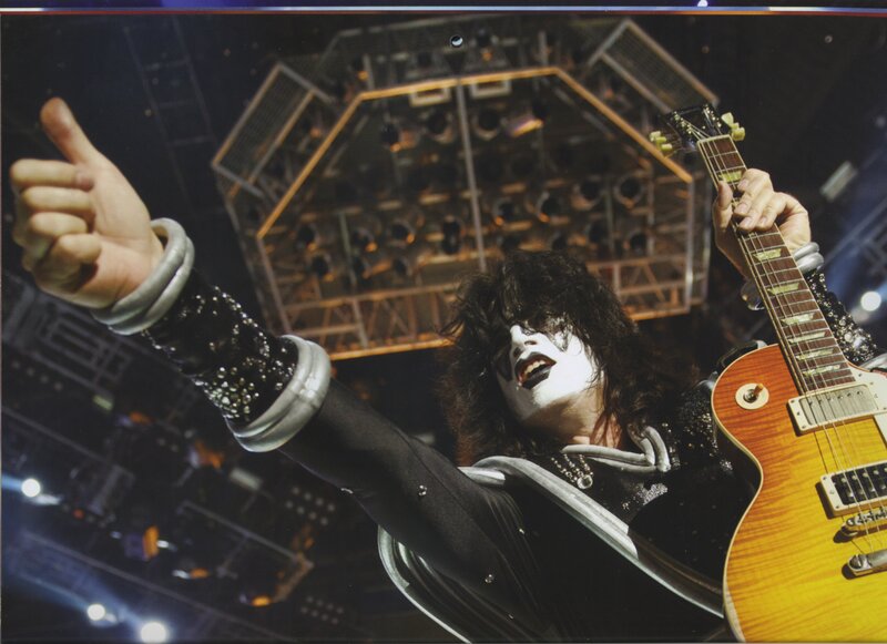 KISS guitarist on stage