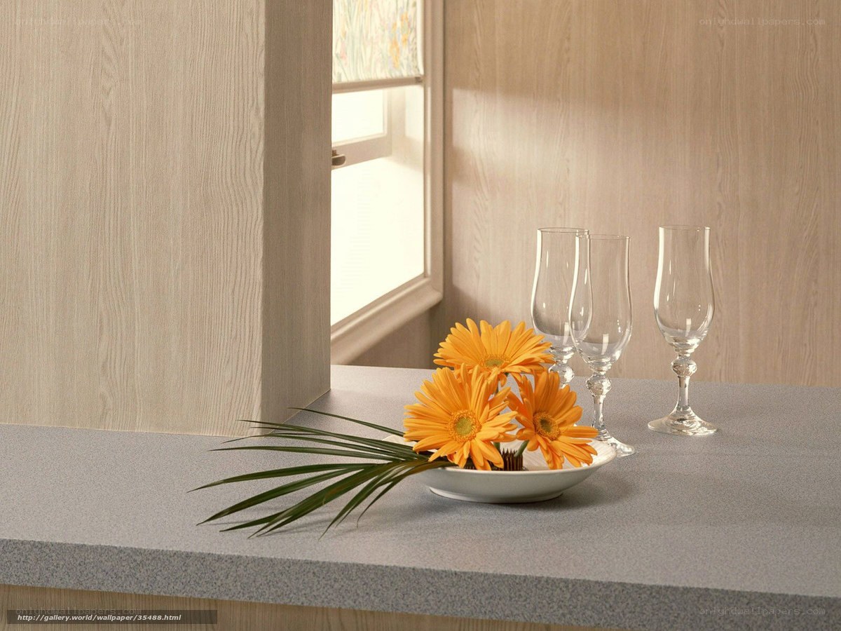 Kitchen counter with flowers and glasses
