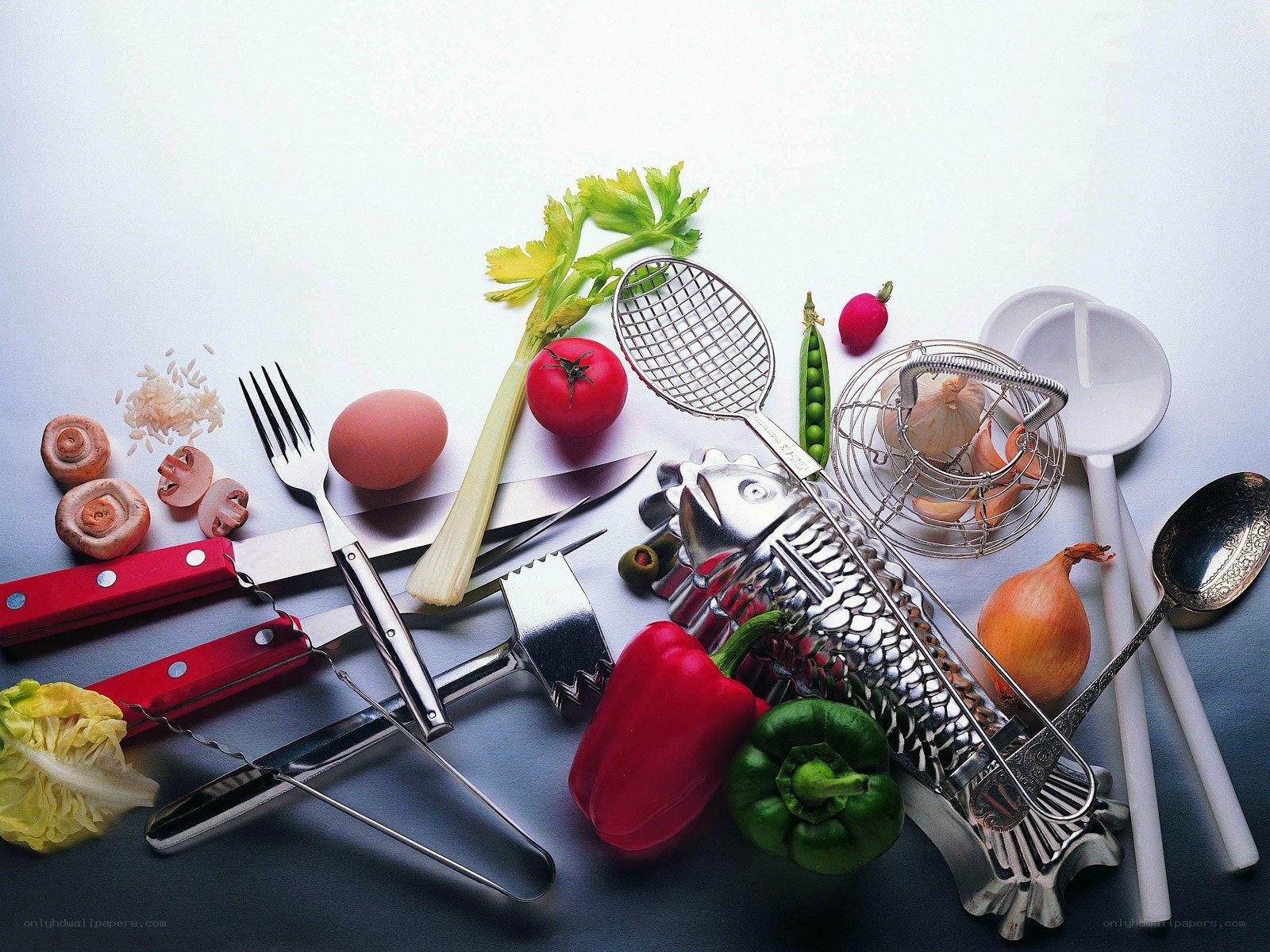 Kitchen tools and fresh vegetables