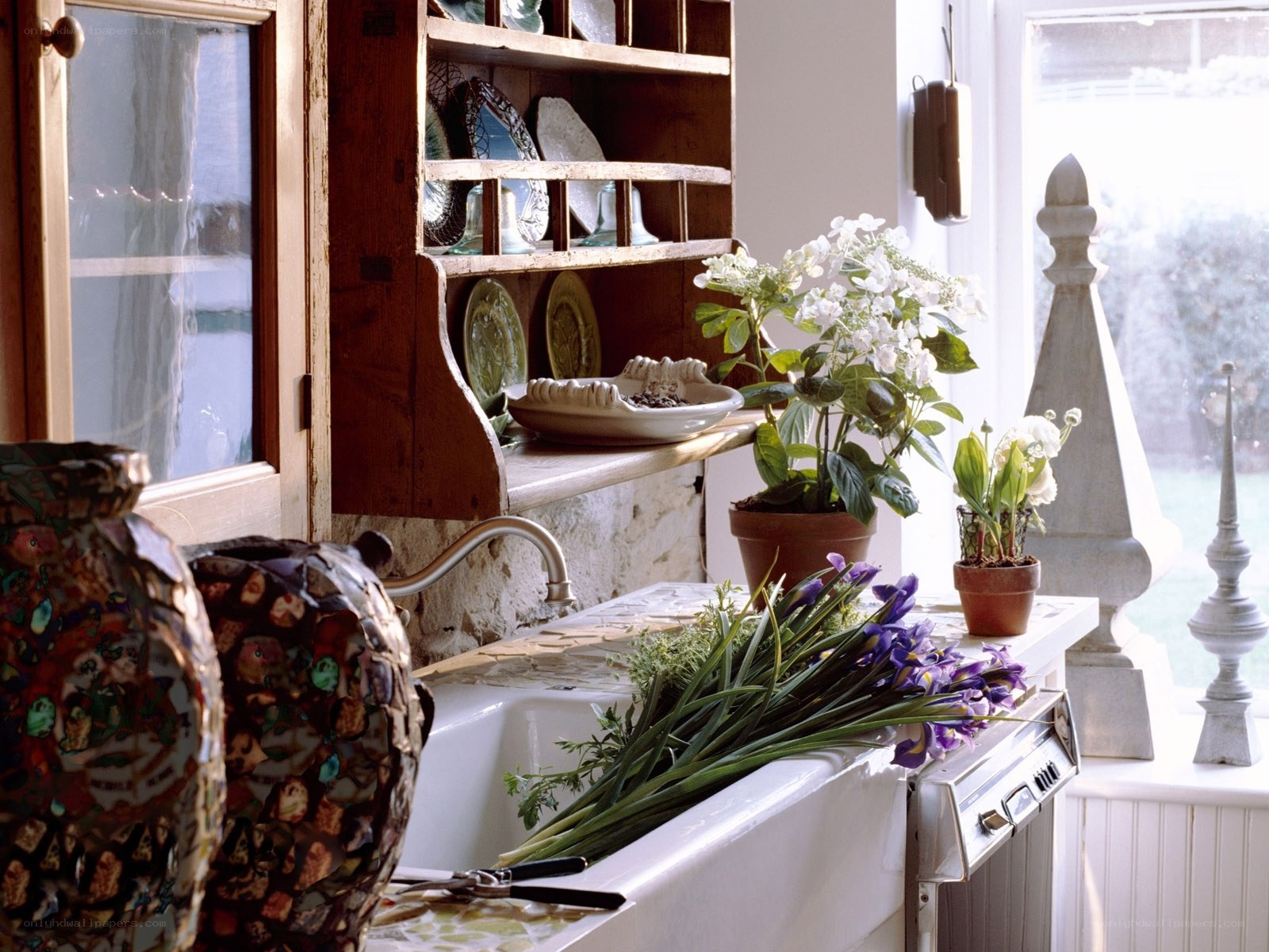 kitchen with flowers and dishes