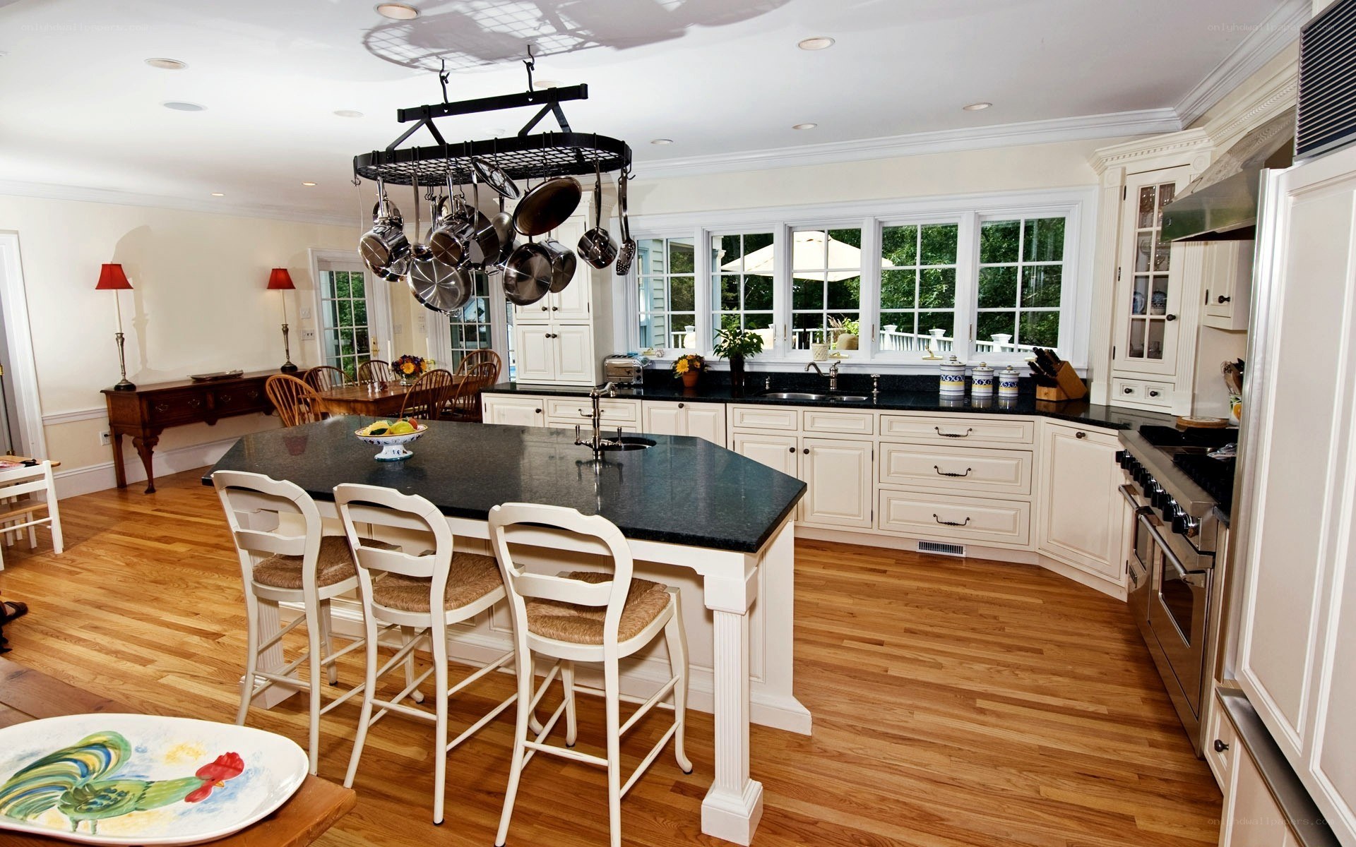 kitchen with island and hanging pots