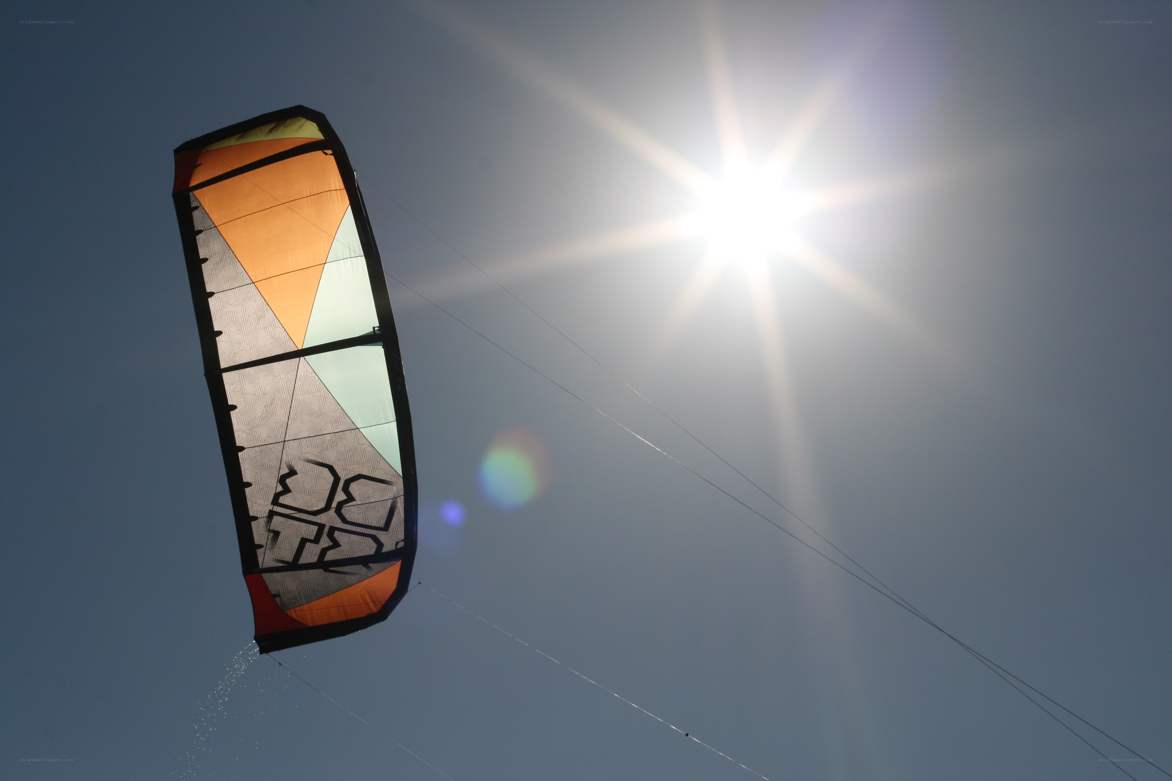 kite flying in bright sun