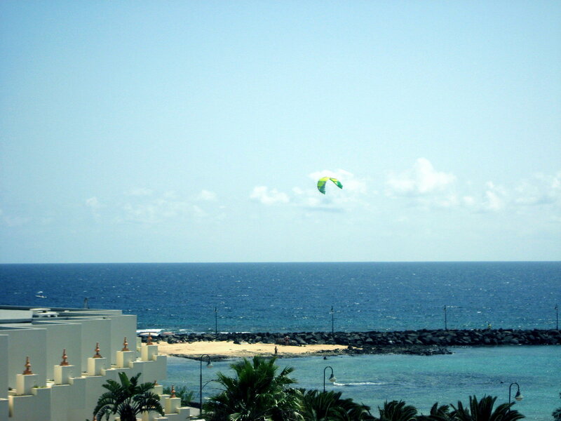 Kite Surfer over Ocean — Blue