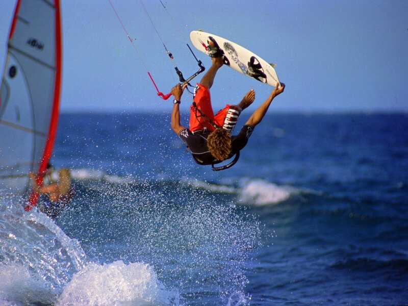 Kite Surfer Performing Trick — Blue