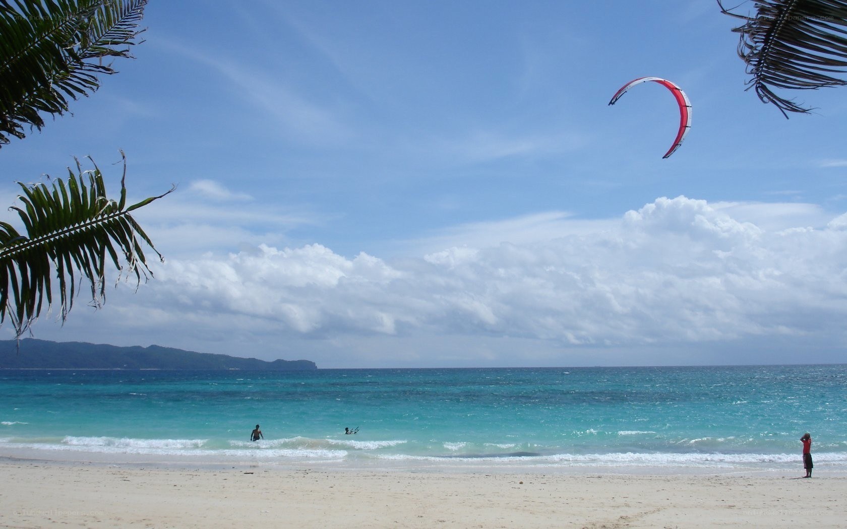 Kite surfing at tropical beach