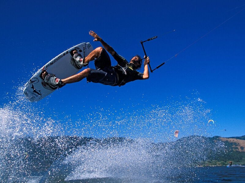 kiteboarder performing aerial trick